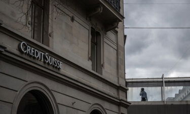 A person talks on the phone at the Credit Suisse bank headquarters in Zurich on March 20.