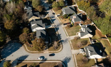 US home prices fell for the seventh month in a row in January. Pictured is a subdivision in Atlanta