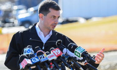 U.S. Transportation Secretary Pete Buttigieg speaks as he visits the site of the derailment of a train carrying hazardous waste in East Palestine