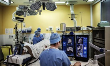 A surgeon performs a robot-assisted prostate surgery on April 10