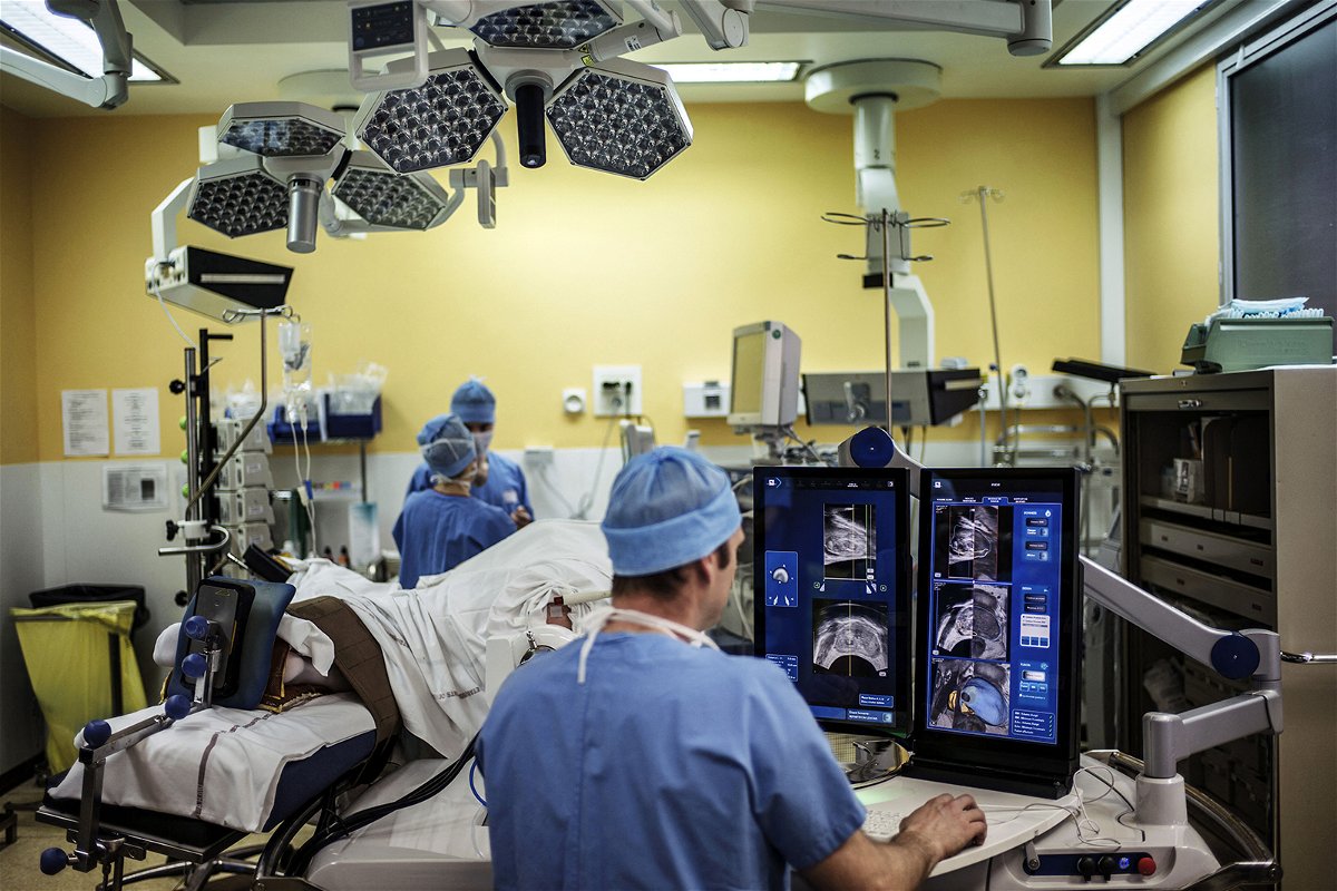 <i>Jeff Pachoud/AFP/Getty Images/File</i><br/>A surgeon performs a robot-assisted prostate surgery on April 10