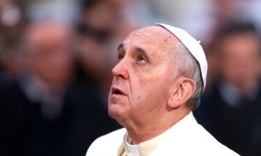 Pope Francis prays in front of the statue of the Immaculate Conception at Spanish Steps December 8