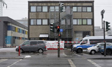 The Kingdom Hall of Jehovah's Witnesses is taped off on Friday after the shooting the night before.