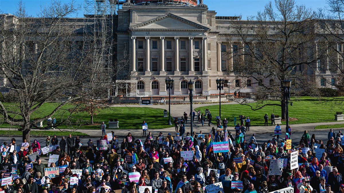 <i>Jon Cherry/Getty Images</i><br/>People gather during a rally to protest the passing of SB 150 on March 29 at the Kentucky State Capitol in Frankfort