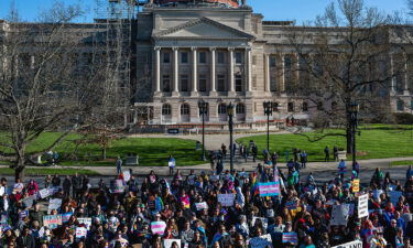 People gather during a rally to protest the passing of SB 150 on March 29 at the Kentucky State Capitol in Frankfort