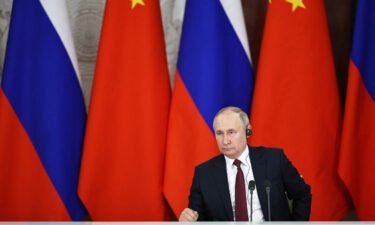 Russian President Vladimir Putin attends a joint statement with Chinese President Xi Jinping following their talks at the Kremlin in Moscow