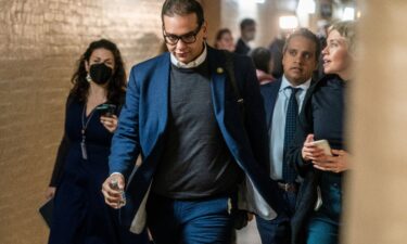 New York Rep. George Santos is seen after leaving a House Republican Caucus meeting in the US Capitol in Washington