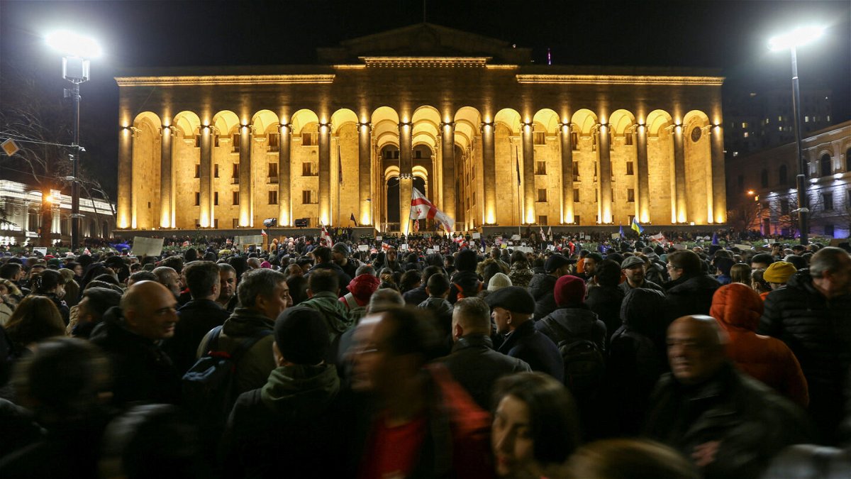 <i>Irakli Gedenidze/Reuters</i><br/>Participants protest against the draft law outside parliament building in Tbilisi