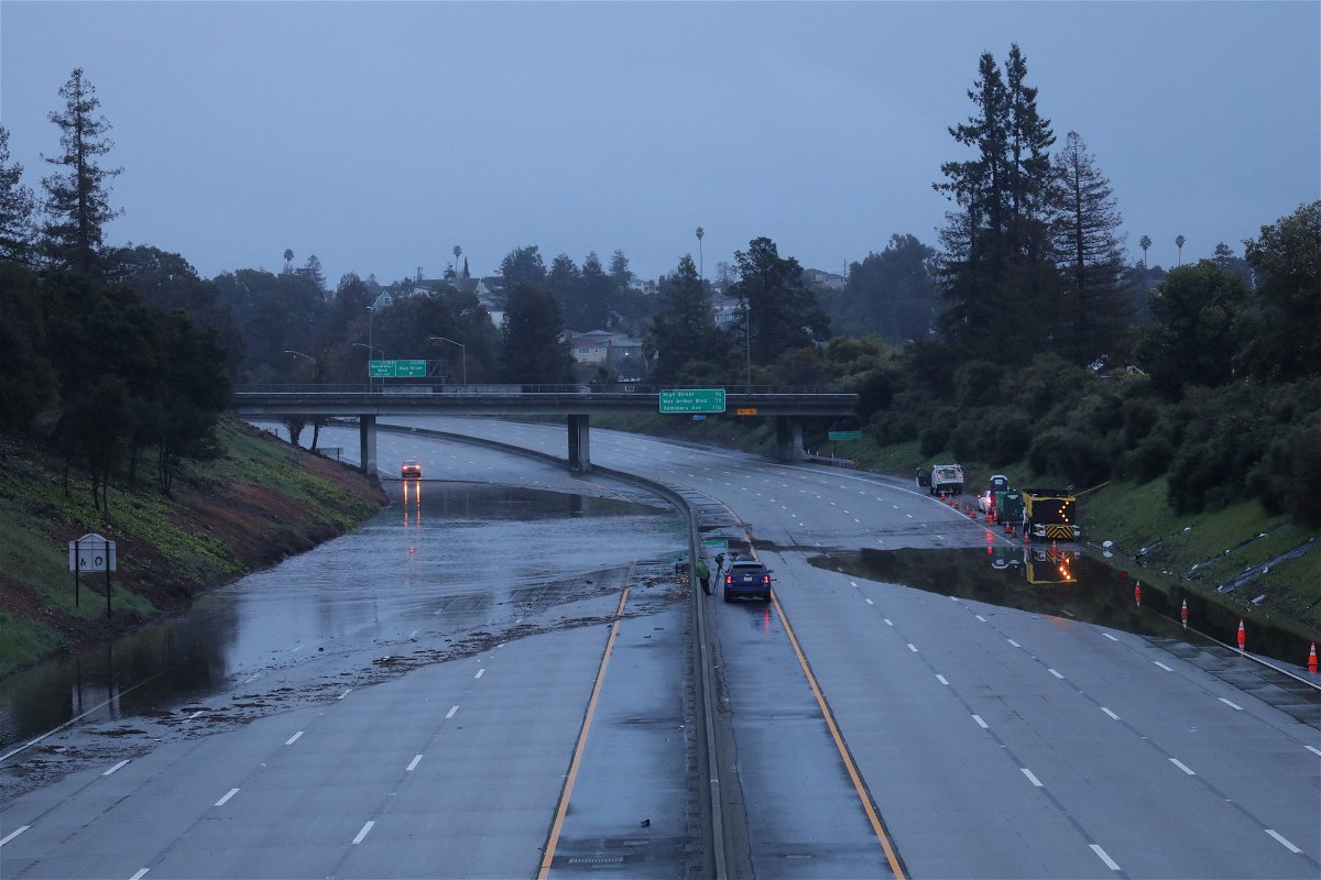<i>Nathan Frandino/Reuters</i><br/>A portion of Interstate 580 is closed due to flooding from an atmospheric river storm system in Oakland
