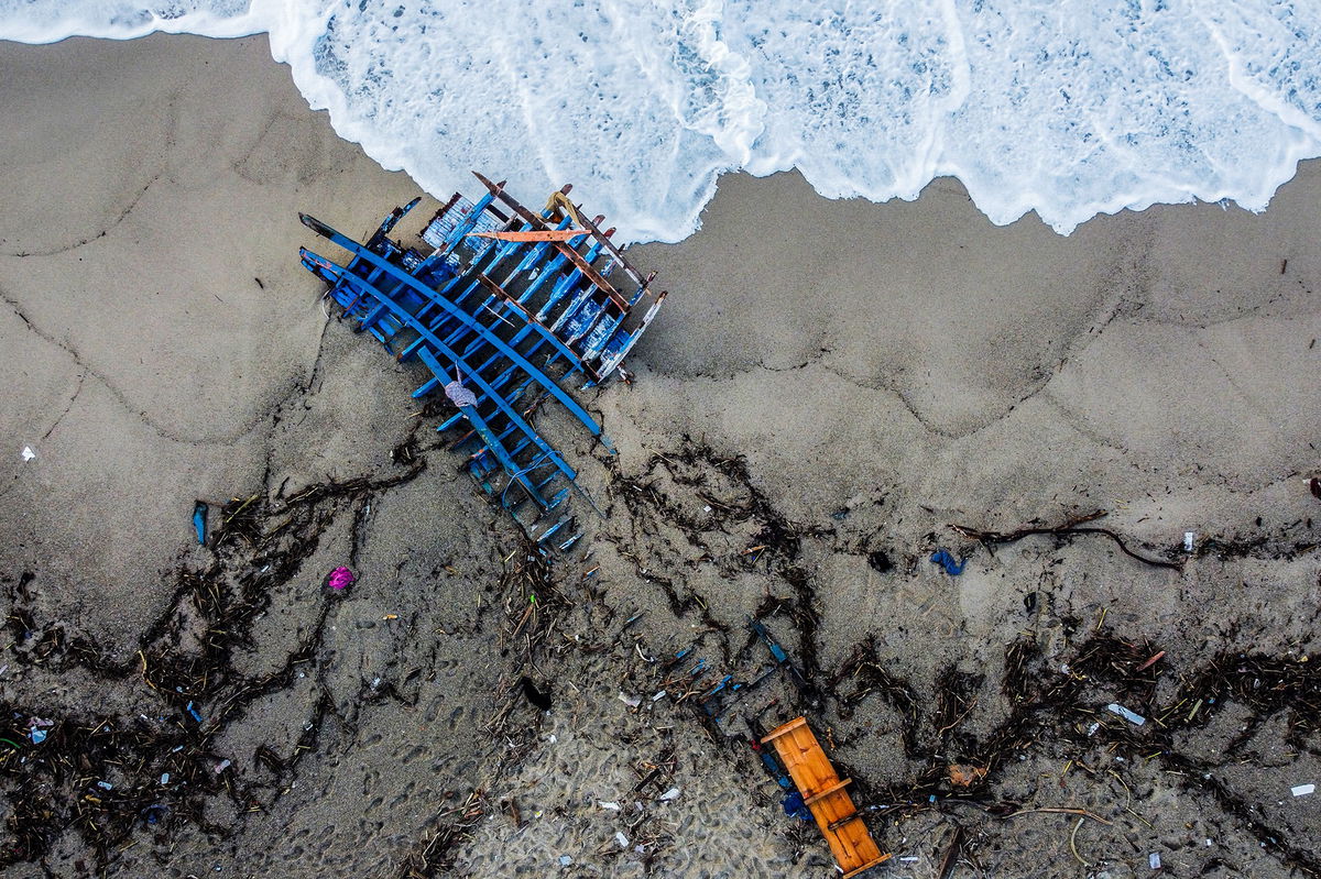 <i>Alessadnro Serrano/AFP/Getty Images</i><br/>Pieces of wood wash up on a beach