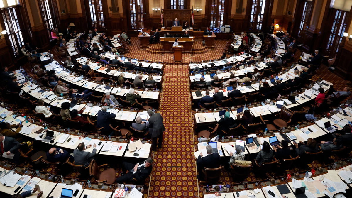 <i>Alex Slitz/AP</i><br/>Lawmakers work in the House chambers during crossover day at the Georgia State Capitol on March 6 in Atlanta.