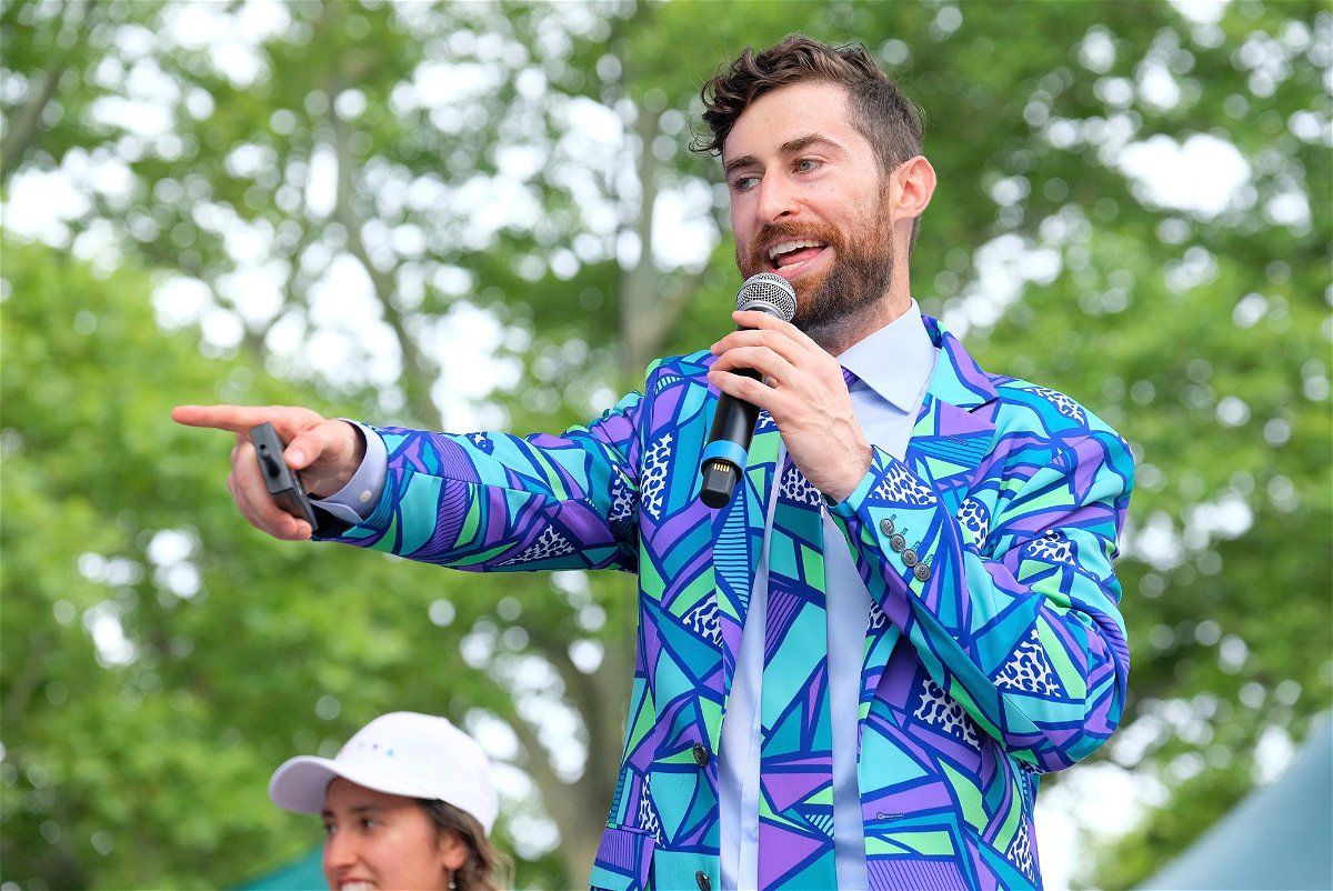<i>Matthew Eisman/Getty Images for Ozy Media</i><br/>HQ host Scott Rogowsky speaks onstage in Central Park on July 22