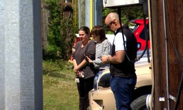 Parents wait outside near Covenant School in Nashville after the shooting on Monday.