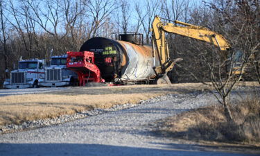 A burnt container is seen at the site where toxic chemicals were spilled following a train derailment in East Palestine