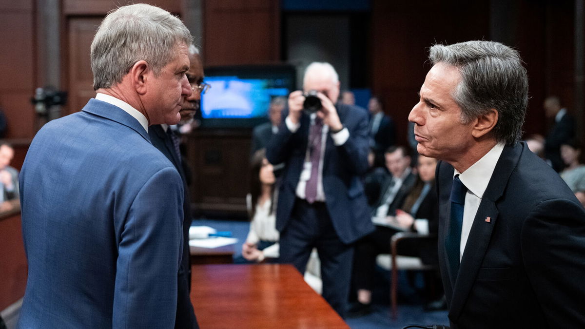 <i>Bill Clark/CQ Roll Call/Getty Images</i><br/>Chairman Michael McCaul (left) and ranking member Gregory Meeks speak with Secretary of State Antony Blinken (right) during a House Foreign Affairs Committee hearing on March 23.