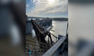 Kentucky crews are working to remove three runaway barges stuck in the Ohio River