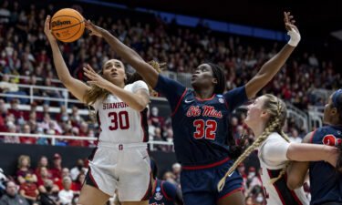 Stanford Cardinal guard Haley Jones (left) attempts a shot against the Ole Miss Rebels with Rita Igbokwe defending.