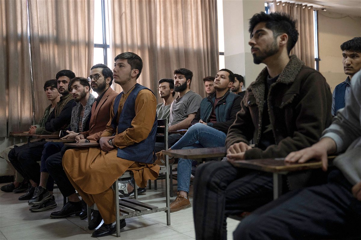 <i>Wakil Kohsar/AFP/Getty Images</i><br/>Male students attend a computer science class after universities reopened in Kabul