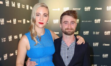 (From left) Erin Darke and Daniel Radcliffe at the 'Weird: The Al Yankovic Story' premiere in 2022 at the Toronto International Film Festival. Scott Boute