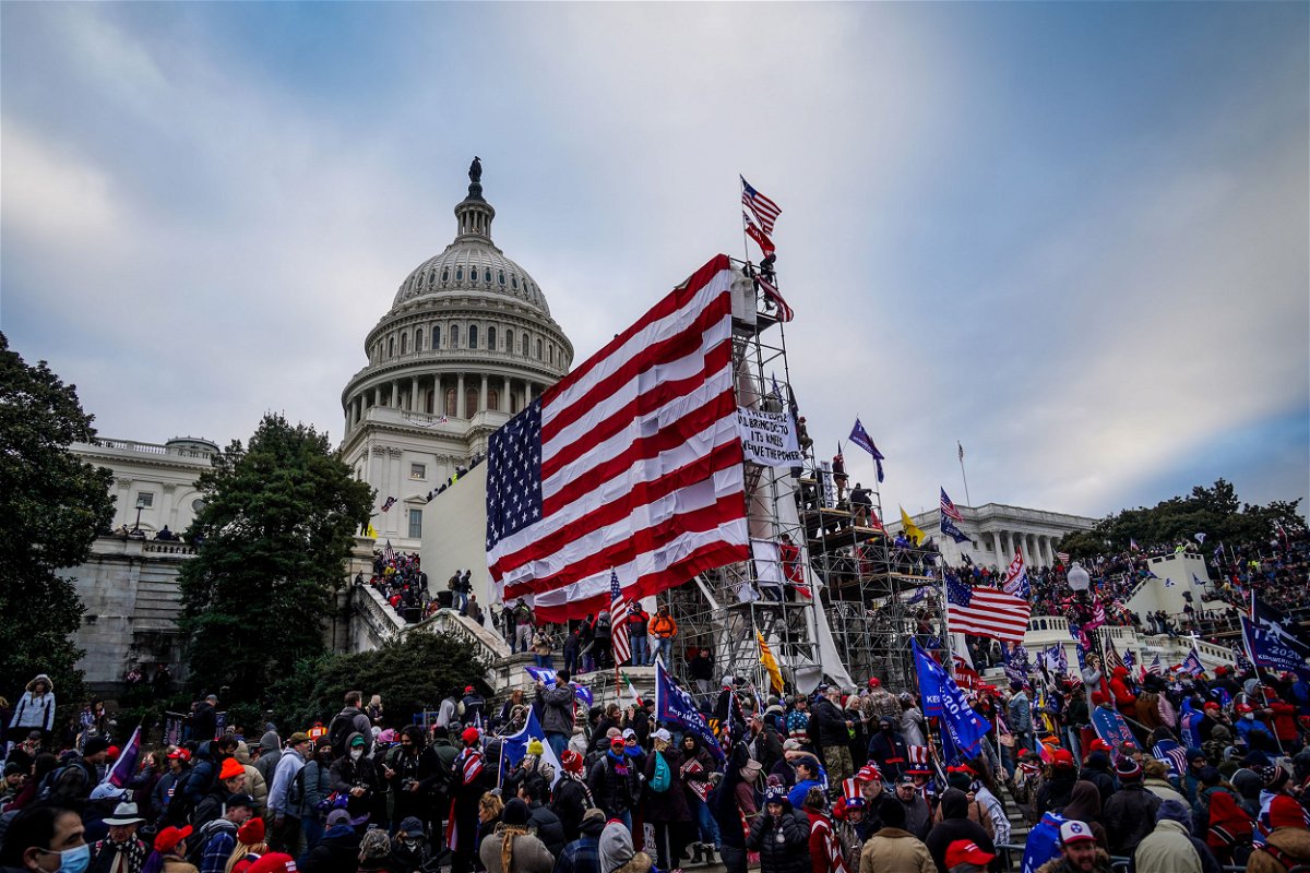 <i>Selcuk Acar/NurPhoto/Getty Images</i><br/>Trump supporters near the US Capitol following a 