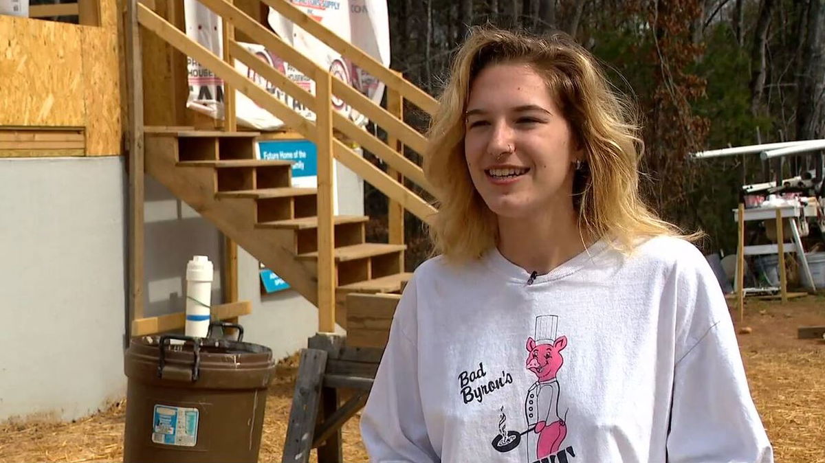 <i>WLOS</i><br/>Emza Shackleford used her break from school to help build homes for the Asheville Area Habitat for Humanity community.