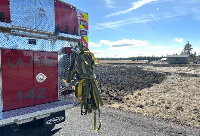 La Pine Fire crews were on scene of escaped burn barrel fire for about two hours Sunday