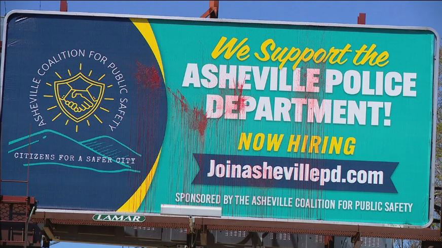 <i></i><br/>Just days after three billboards backing the police department went up in Asheville