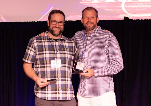 Alan Wheeler, Redmond High School construction technology instructor (left) and Josh Davis, Ridgeview High School computer science teacher (right) received awards Friday at the ACTE conference in Bend