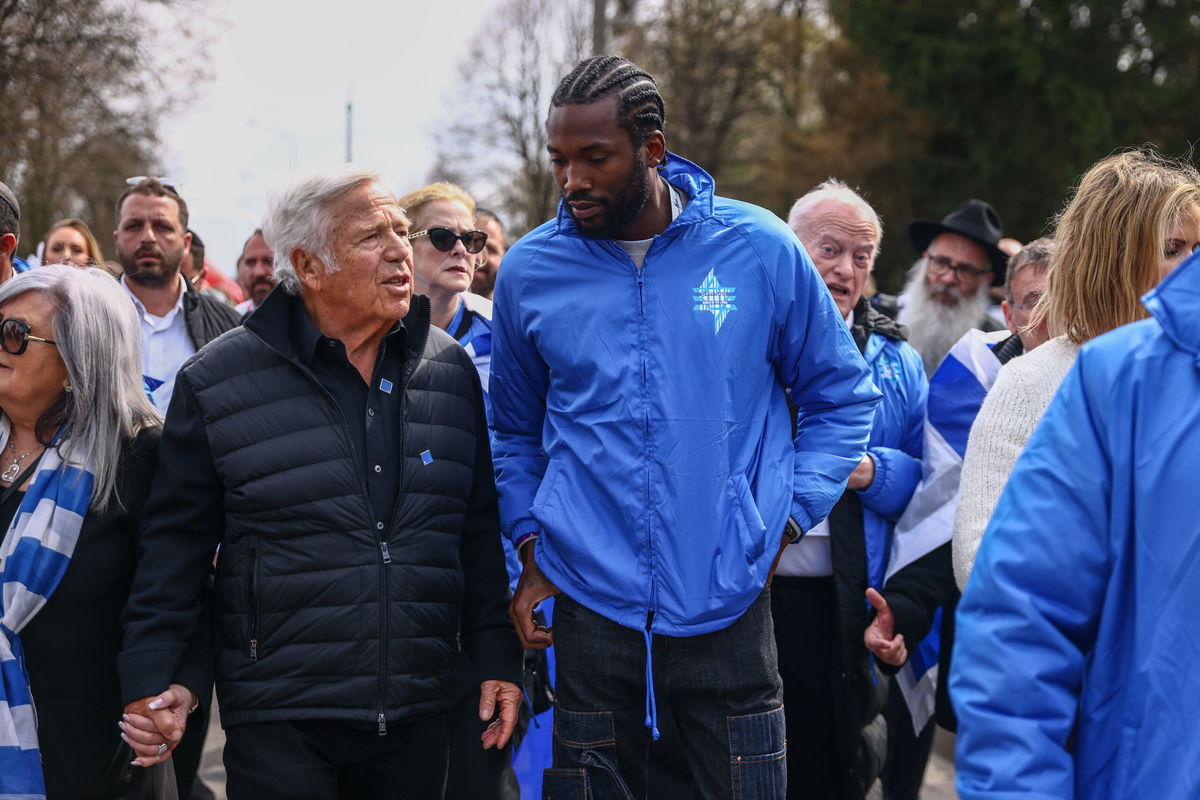 <i>Beata Zawrzel/NurPhoto/Getty Images</i><br/>New England Patriots owner Robert Kraft and rapper Meek Mill attend the March of the Living from Auschwitz to Birkenau on April 18