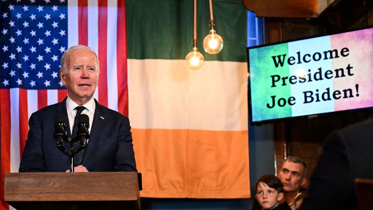 <i>Jim Watson/AFP/Getty Images</i><br/>President Joe Biden delivers a speech at the Windsor Bar in Dundalk