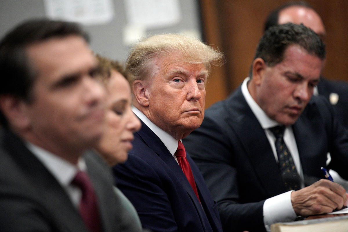 <i>Curtis Means/Pool/Reuters</i><br/>Former President Donald Trump appears in court with members of his legal team for an arraignment on charges stemming from his indictment by a Manhattan grand jury following a probe into hush money paid to adult film star Stormy Daniels