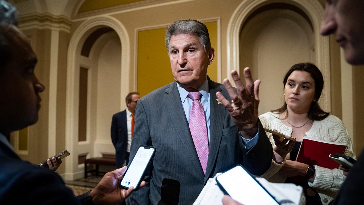 <i>Jabin Botsford/The Washington Post/Getty Images</i><br/>Sen. Joe Manchin speaks to reporters on Capitol Hill on March 22.