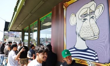 People wait in line at the April 2022 grand opening of the Bored & Hungry pop-up burger restaurant in Long Beach
