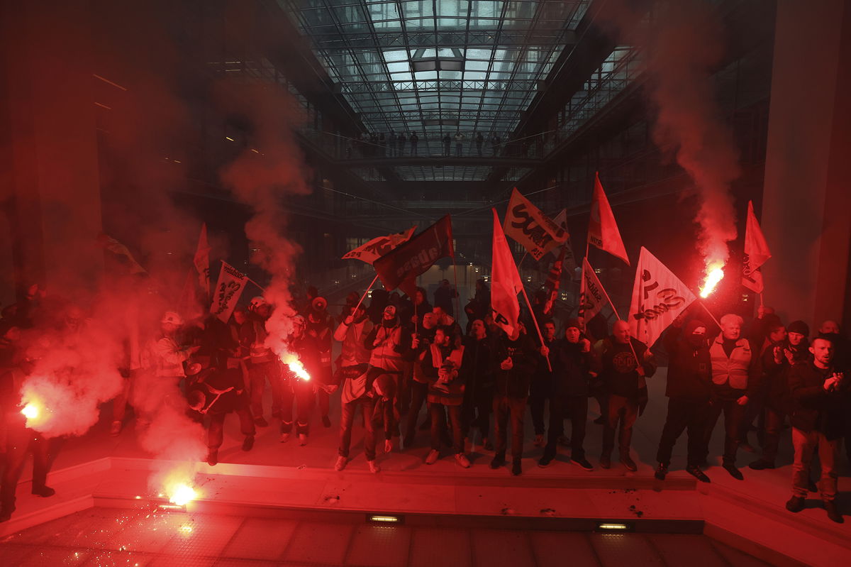 <i>Aurelien Morissard/AP</i><br/>Demonstrators invade BlackRock's office in Paris