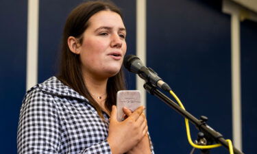 Cori Conlon singing "We Shall Overcome" on the 50th anniversary of the Ballymurphy massacre.