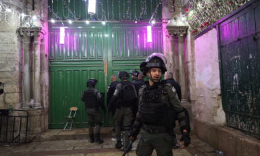 Israeli police enter the al-Aqsa mosque in Jerusalem on April 4