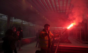 Demonstrators storm the French luxury group LVMH's headquarters on Thursday in Paris.