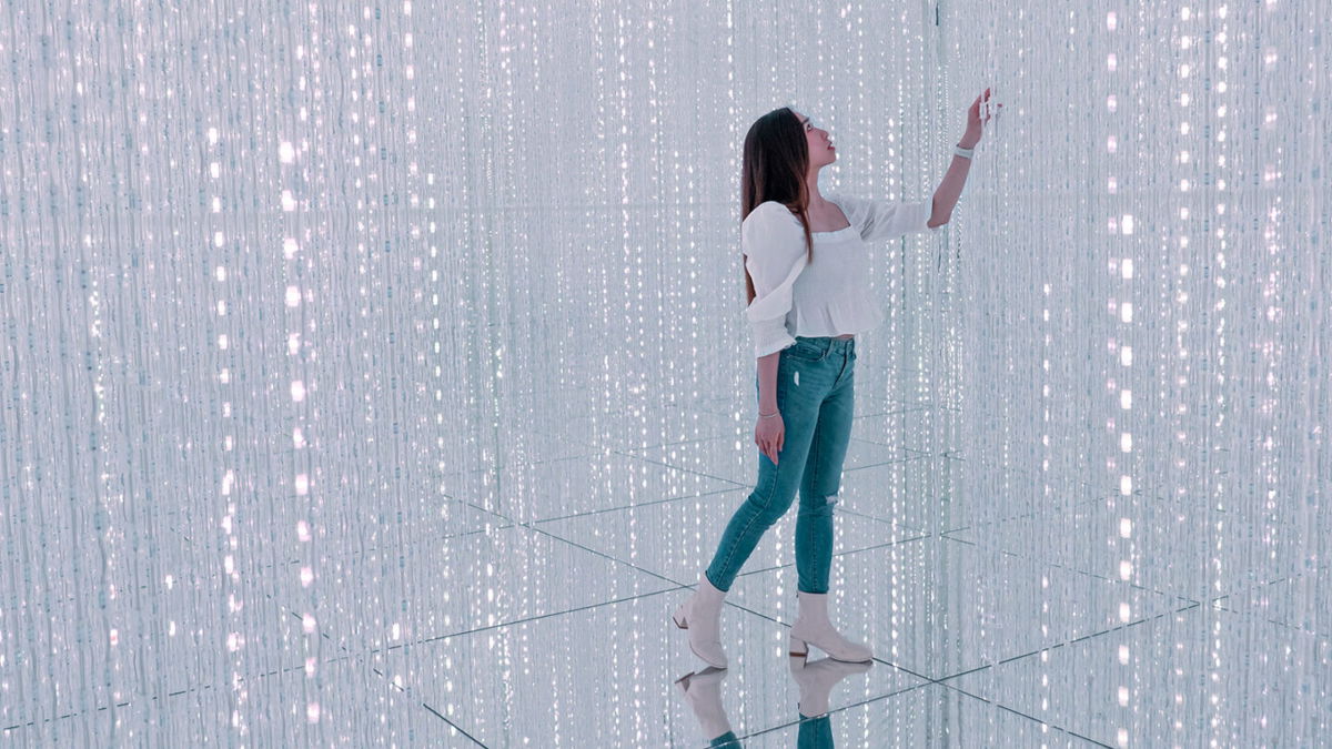 <i>Noemi Cassanelli/CNN</i><br/>A woman poses for pictures inside the teamLab SuperNature museum at the Venetian Macao resort and casino in Macao