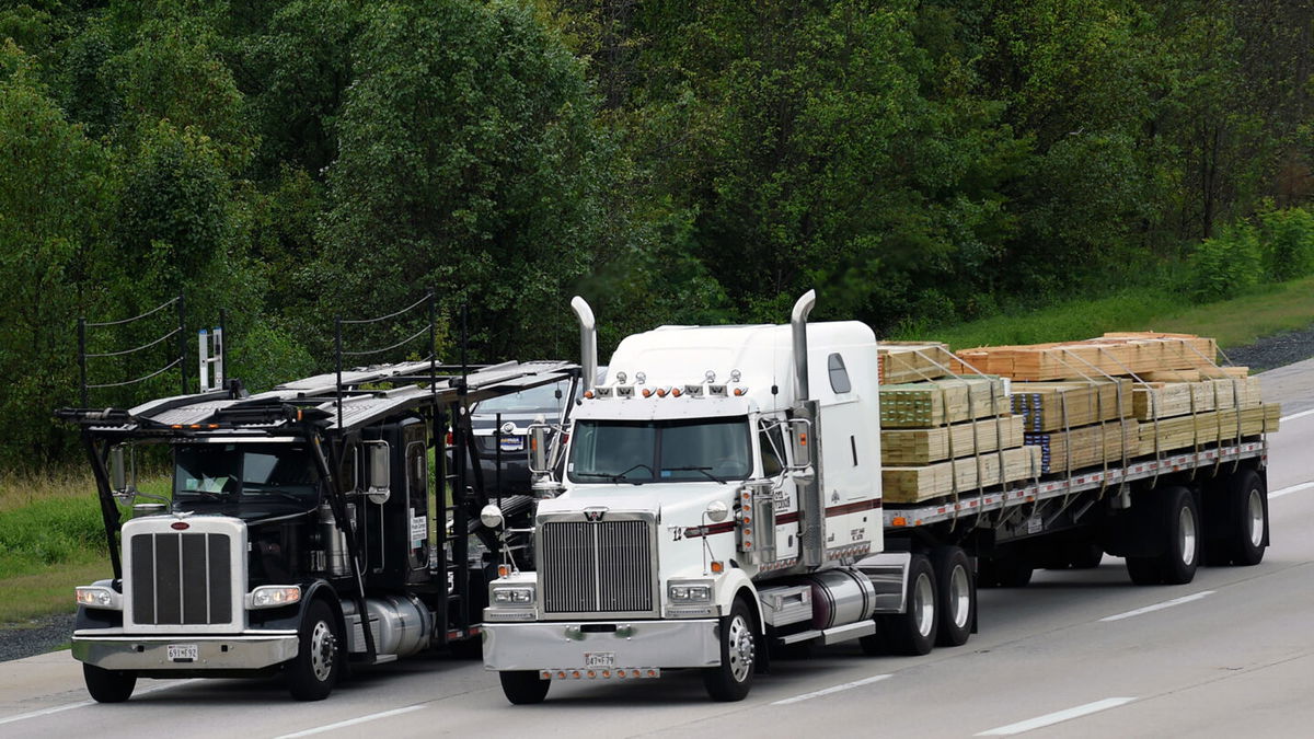 <i>Susan Walsh/AP</i><br/>Trucks head eastbound on Route 50 in Bowie