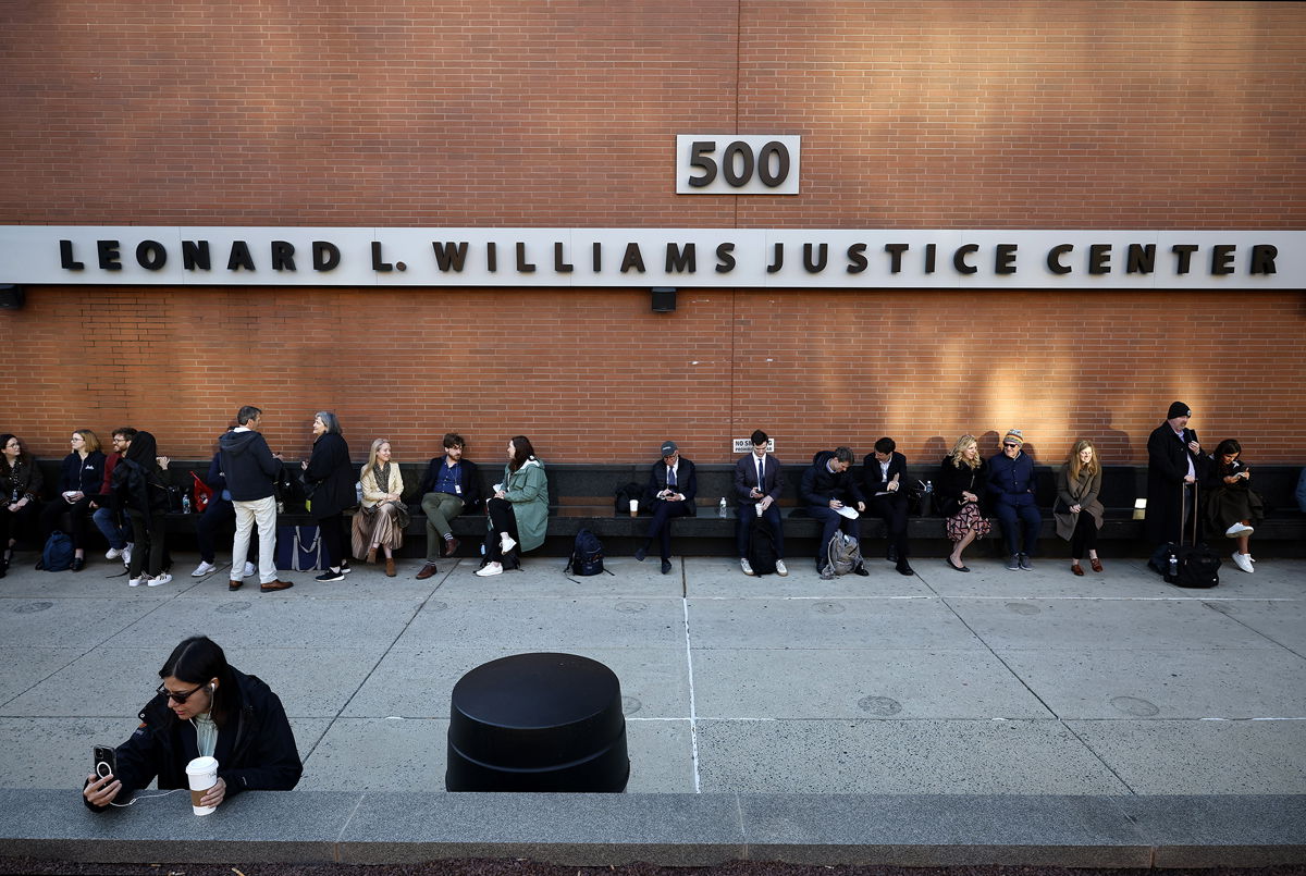 <i>Chip Somodevilla/Getty Images</i><br/>Reporters and members of the public line up early to enter the Leonard Williams Justice Center where Dominion Voting Systems is suing FOX News in Delaware Superior Court on April 18 in Wilmington