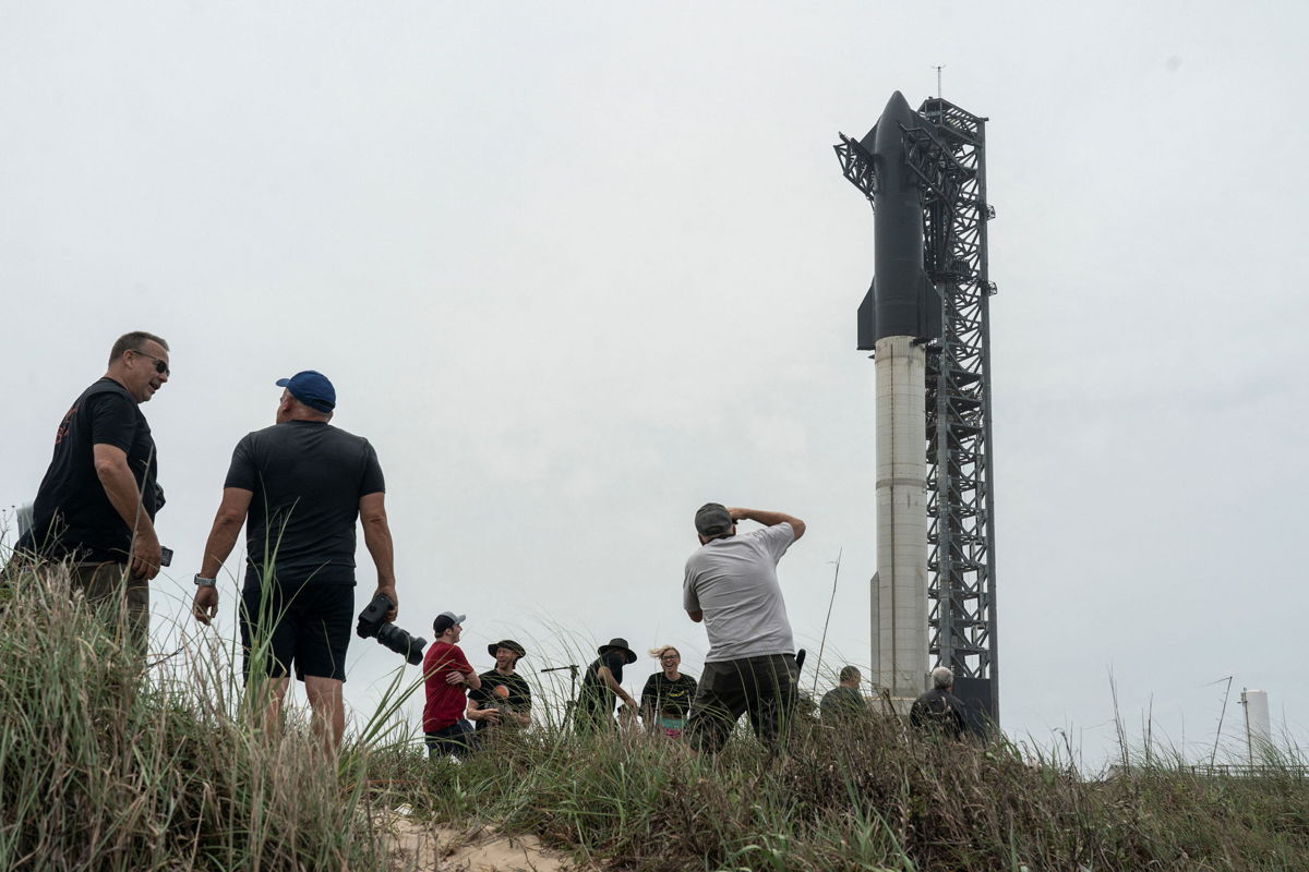 <i>Go Nakamura/Reuters</i><br/>Spectators gathers to watch the SpaceX Starship on its Boca Chica launchpad after the U.S. Federal Aviation Administration granted a long-awaited license allowing Elon Musk's SpaceX to launch the rocket to orbit for the first time