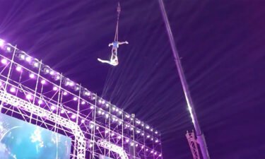 The acrobat couple are seen performing another set of aerial silks routine before the accident.