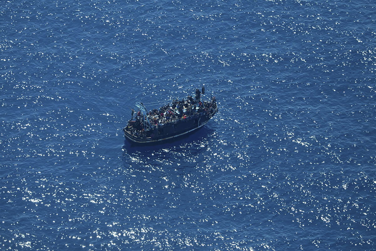 <i>Giacomo Zorzi/Sea-Watch/AP</i><br/>Some 400 people were stranded on a boat in the central Mediterranean
