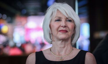 Tina Peters reacts to early election returns during a primary night watch party at the Wide Open Saloon on June 28