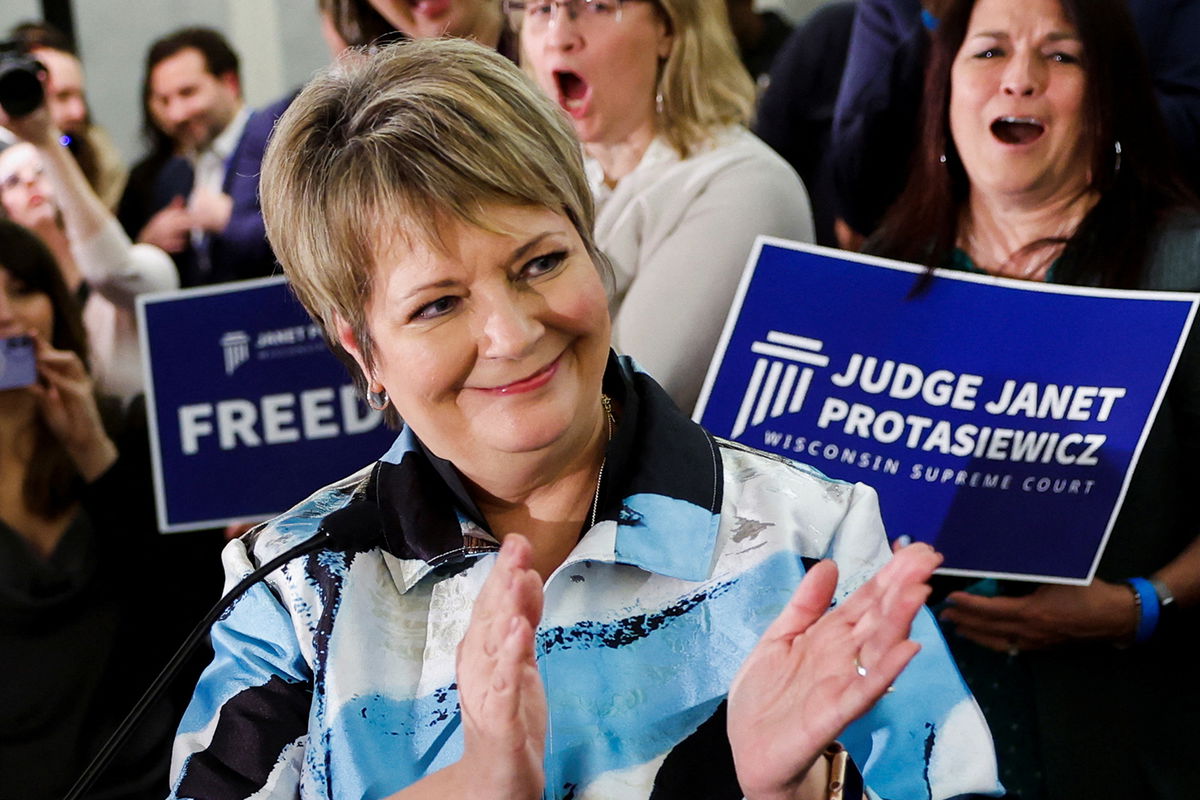 <i>Evelyn Hockstein/Reuters</i><br/>Janet Protasiewicz celebrates at her election night watch party in Milwaukee