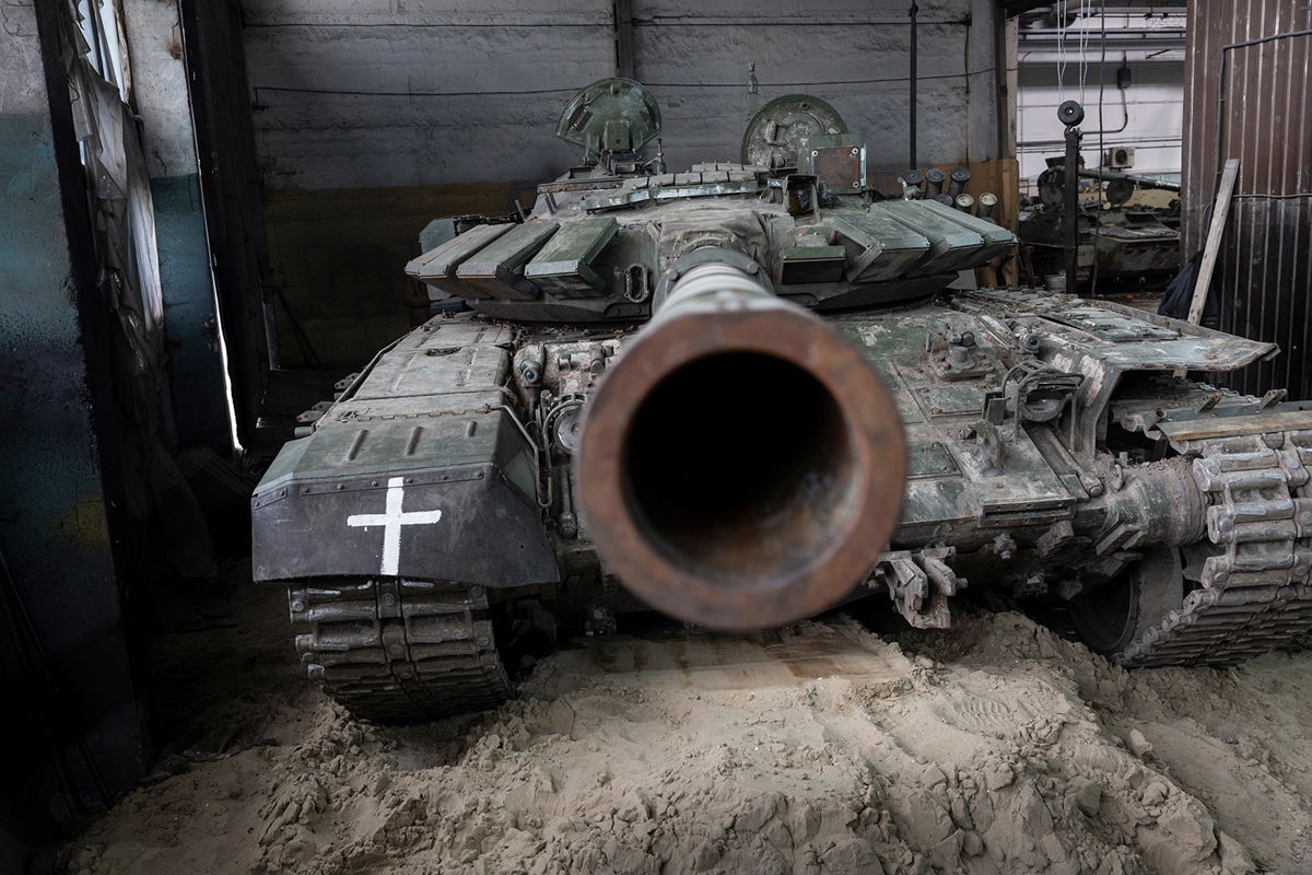 <i>John Moore/Getty Images</i><br/>A captured Russian T-72B3 tank awaits repairs on February 13