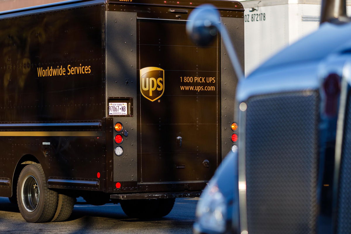 <i>Paul Frangipane/Bloomberg/Getty Images</i><br/>UPS says the US economy is slowing down. Delivery trucks are here parked outside a UPS hub in Brooklyn.