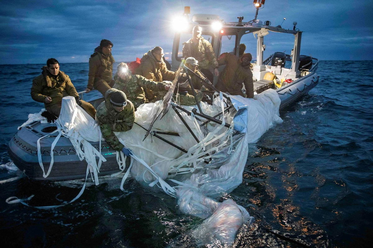 <i>U.S. Fleet Forces/U.S. Navy/Reuters</i><br/>The Chinese spy balloon that transited the US earlier this year was able to collect intelligence from US military sites. The recovered balloon is pictured here off the coast of South Carolina