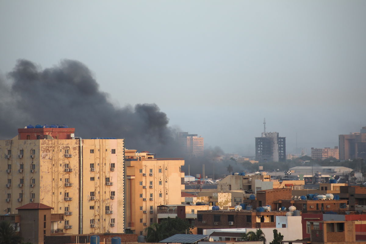 <i>Anadolu Agency/Getty Images</i><br/>Smoke rises during clashes between the Sudanese Armed Forces and the paramilitary Rapid Support Forces (RSF) on the first day of Eid Al-Fitr in Khartoum