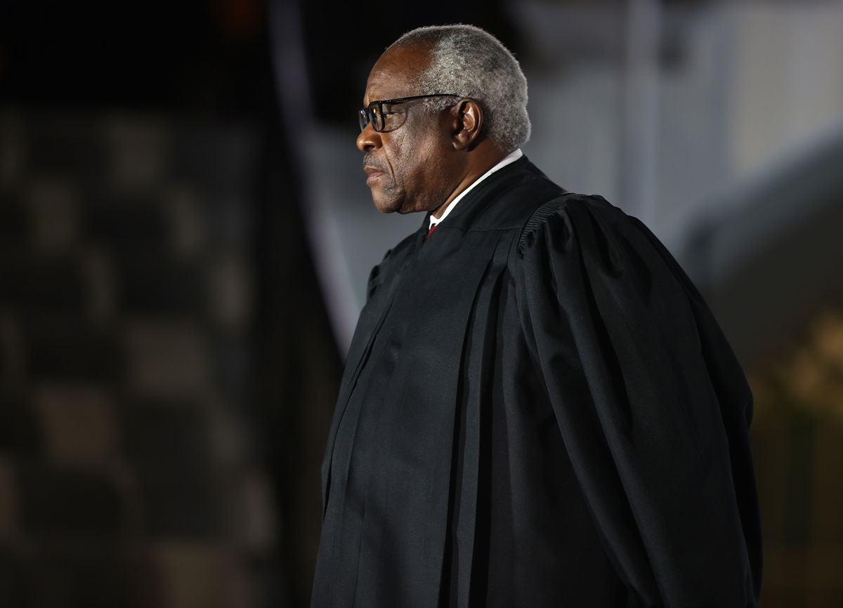 <i>Tasos Katopodis/Getty Images</i><br/>Supreme Court Justice Clarence Thomas attends the ceremonial swearing-in ceremony for Amy Coney Barrett on the South Lawn of the White House on October 26